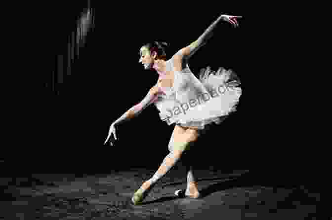 A Ballerina Gracefully Dancing On Stage, Her Arms Extended And Her Body In Motion Dancing My Dream