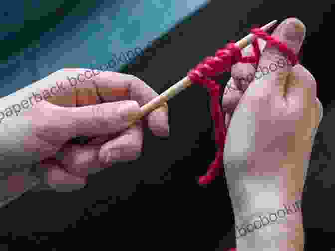 A Close Up Image Of A Person's Hands Casting On Stitches On A Pair Of Knitting Needles Lily Chin S Knitting Tips And Tricks: Shortcuts And Techniques Every Knitter Should Know