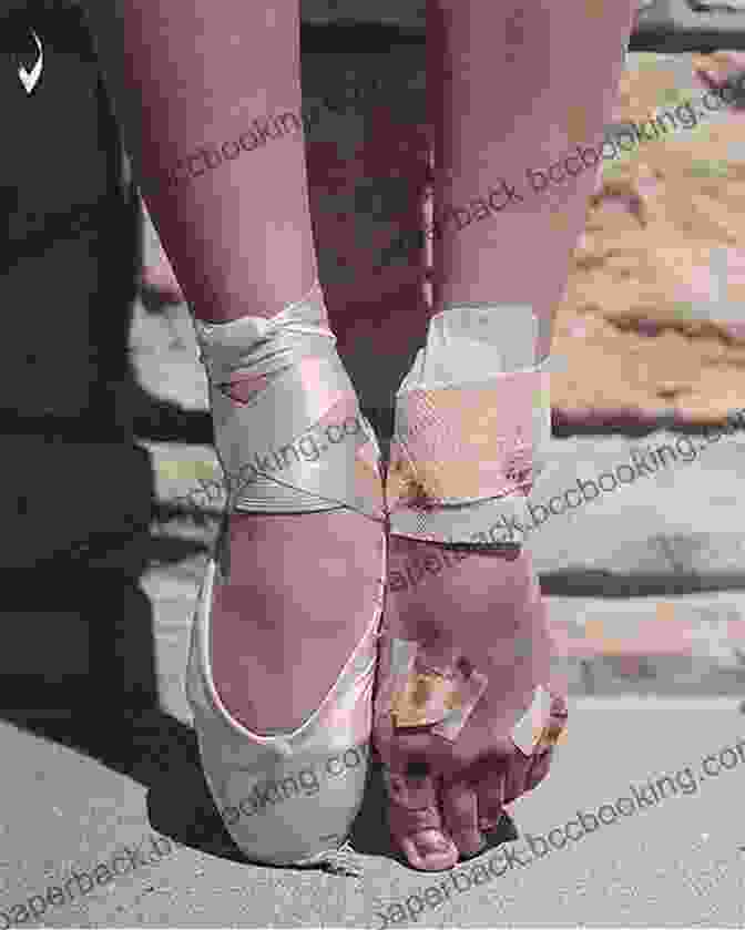 A Close Up Of A Ballerina's Feet In Pointe Shoes Demonstrating A Precise Ballet Step The Essential Ballet Guidebook: Fundamental Techniques To Advanced Practices: Ballet Home Training
