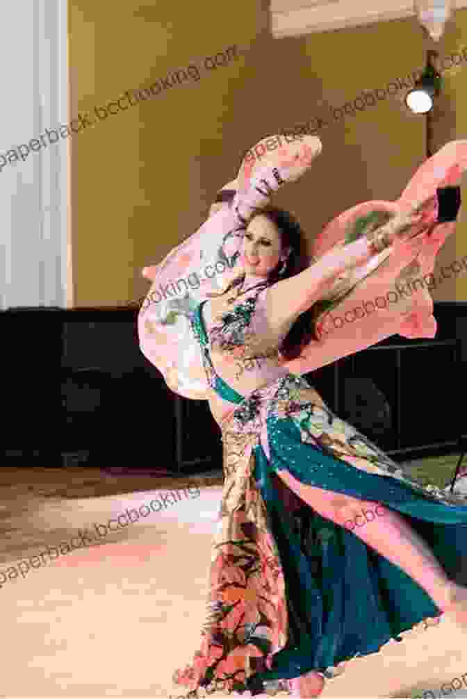 A Dancer Showcasing Impressive Flexibility During A Belly Dance Performance. A Belly Dance Companion: Your Essential Guide To Belly Dance