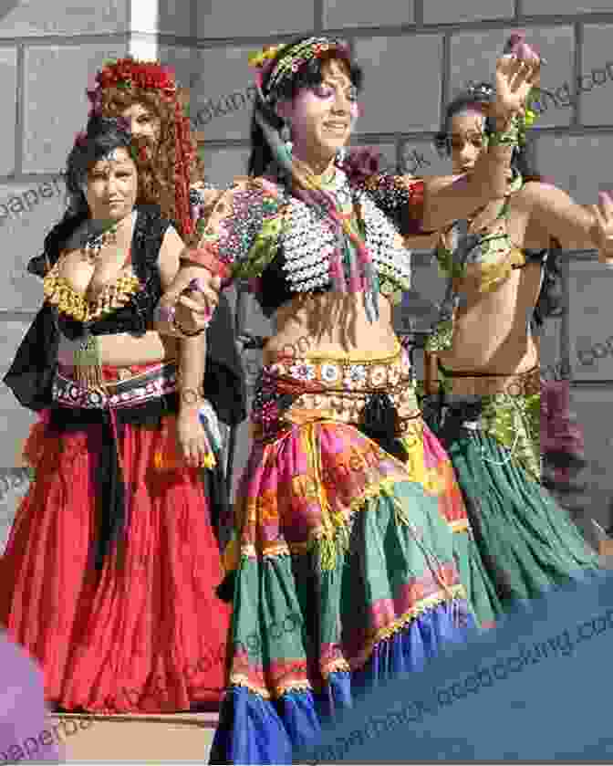 A Display Of Vibrant Belly Dance Costumes. A Belly Dance Companion: Your Essential Guide To Belly Dance