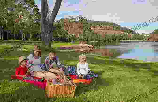 A Family With A Child In A Wheelchair Enjoying A Picnic In A National Park. Go Outside: Connect And Learn With Your Family In The U S National Parks