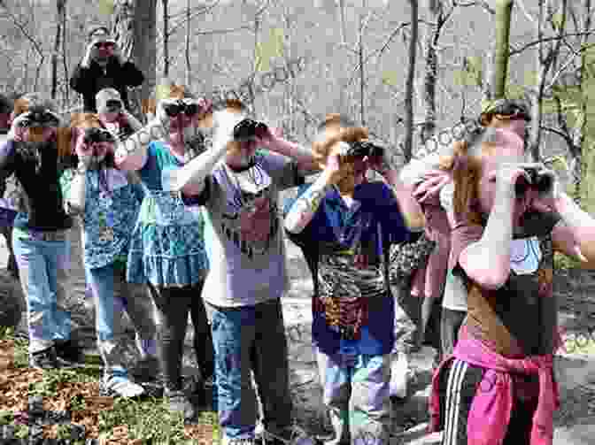 A Group Of Children Using Binoculars To Observe Birds In A National Park. Go Outside: Connect And Learn With Your Family In The U S National Parks