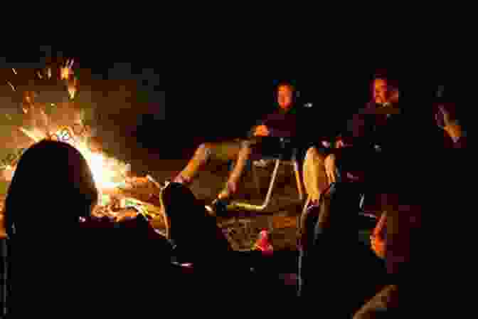 A Group Of Hikers Enjoying A Campfire Waterton Lakes National Park Hiking Guide
