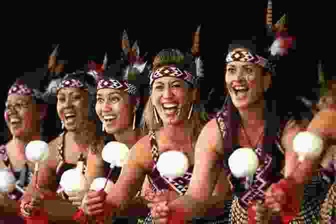 A Group Of Maori People Performing A Traditional Dance, Surrounded By Intricate Carvings And Artifacts Two Islands Two Couples Two Camper Vans: A New Zealand Travel Adventure