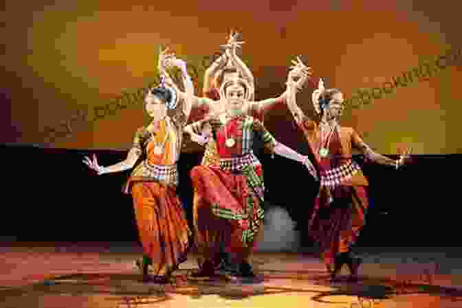 A Group Of People Performing A Traditional Indian Dance. David Wallace Goes To India