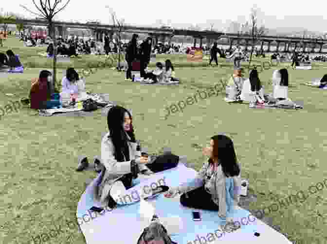 A Group Of Young Koreans Enjoying A Picnic In A Seoul Park Probably True Stories: Korea As It May Or May Not Be