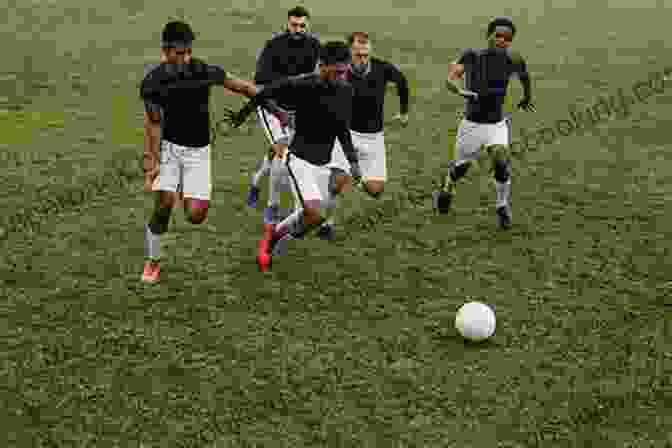 A Group Of Young Men Playing Soccer Outcasts United: The Story Of A Refugee Soccer Team That Changed A Town