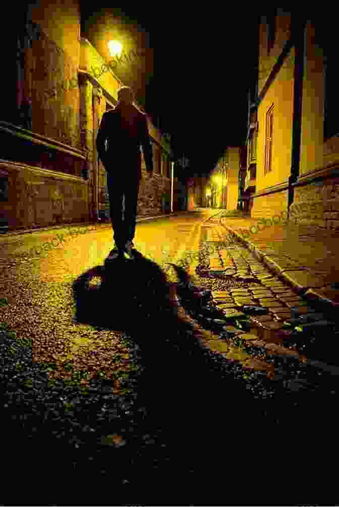 A Shadowy Figure Walking Down A Cobblestone Alleyway At Night A Small Town: A Novel Of Crime