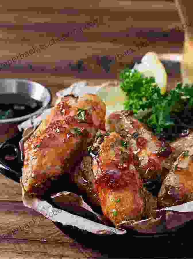 Glazed Chicken Wings Coated In A Sweet And Tangy Jack Daniel's Sauce, Served With A Side Of Dipping Sauce Copycat Recipes: Making T G I Fridays Most Popular Dishes At Home (Famous Restaurant Copycat Cookbooks)