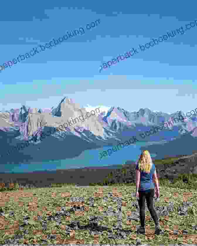 Hikers Enjoy A Leisurely Walk Along The Bald Hills Trail, Surrounded By Wildflowers And Panoramic Views Of The Athabasca Valley. Jasper National Park Hiking Guide: A Guide To Day Hikes In Jasper National Park