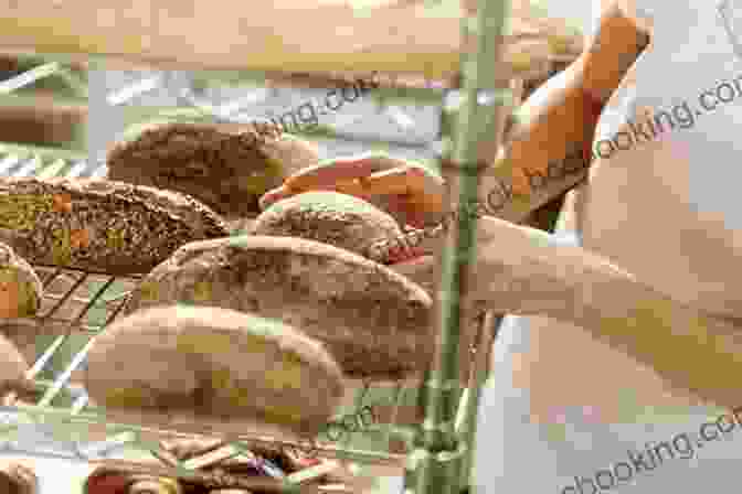 Image Of A Baker Examining A Loaf Of Bread Patisserie: A Step By Step Guide To Baking French Breads In Your Home