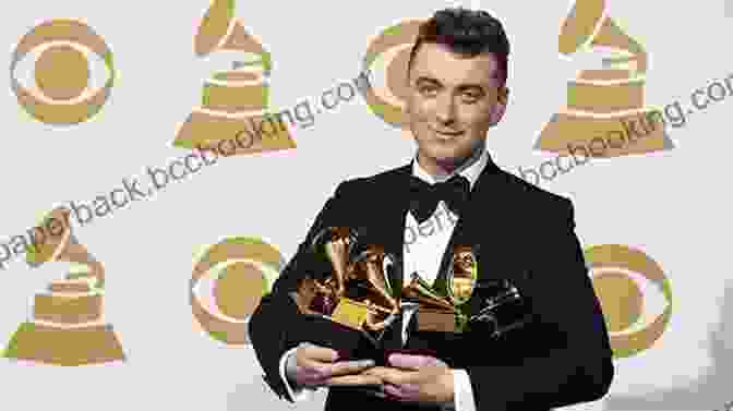 Sam Smith Holding A Grammy Award, Recognizing His Exceptional Achievements In Music. I Ll Show You Sam Smith