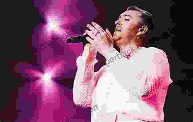 Sam Smith Performing Live On Stage, Captivating The Audience With His Soulful Vocals. I Ll Show You Sam Smith