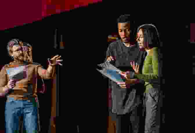 Two Actors Engaged In A Passionate Dialogue On Stage The Art And Craft Of Playwriting